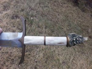 48in sword - caribou handle w wolf head A