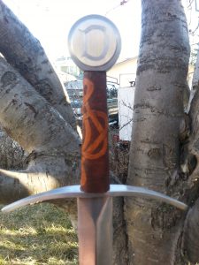 arming sword 33in blade 7in handle w pommel weight 2.5lbs POB 4.5in fr guard - celtic knot carved handle w engraving B